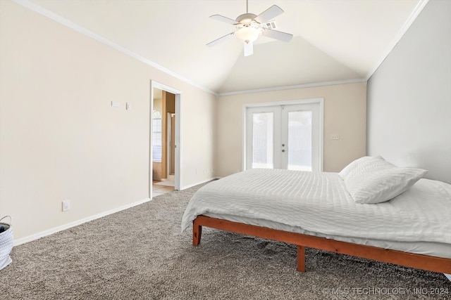 bedroom with vaulted ceiling, connected bathroom, carpet, ornamental molding, and ceiling fan