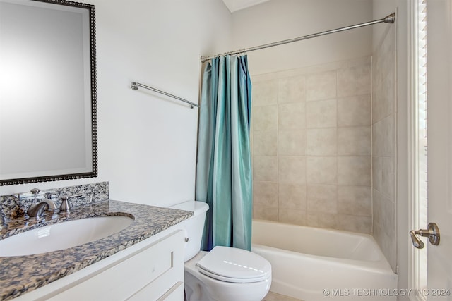 full bathroom featuring vanity, toilet, and shower / bath combination with curtain