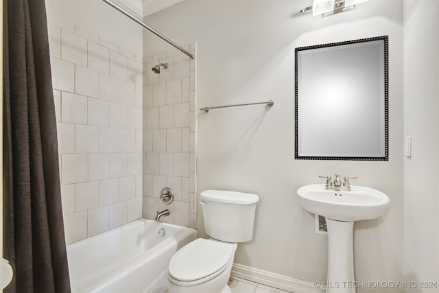 full bathroom featuring shower / tub combo with curtain, toilet, tile patterned flooring, and sink