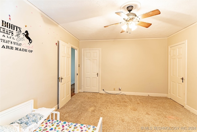 unfurnished bedroom with light carpet and ceiling fan