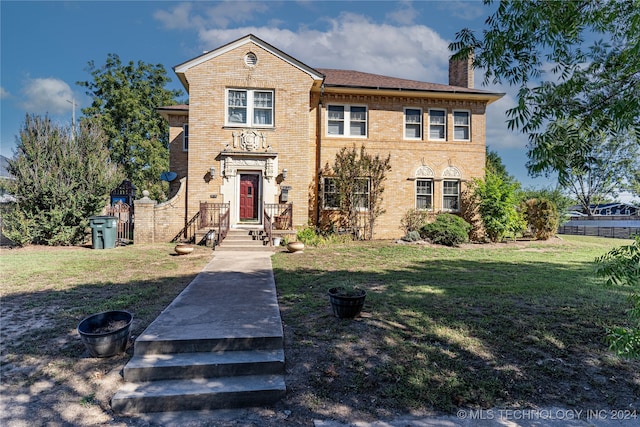 view of front of home with a front yard