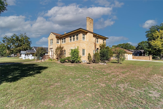 view of property exterior with a yard