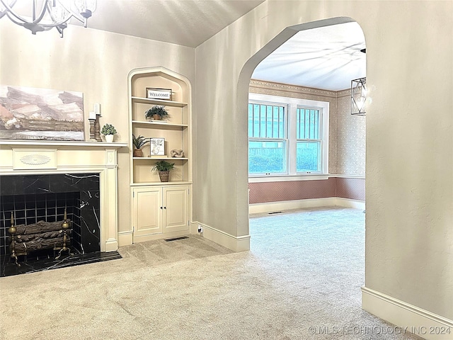 unfurnished living room featuring light carpet