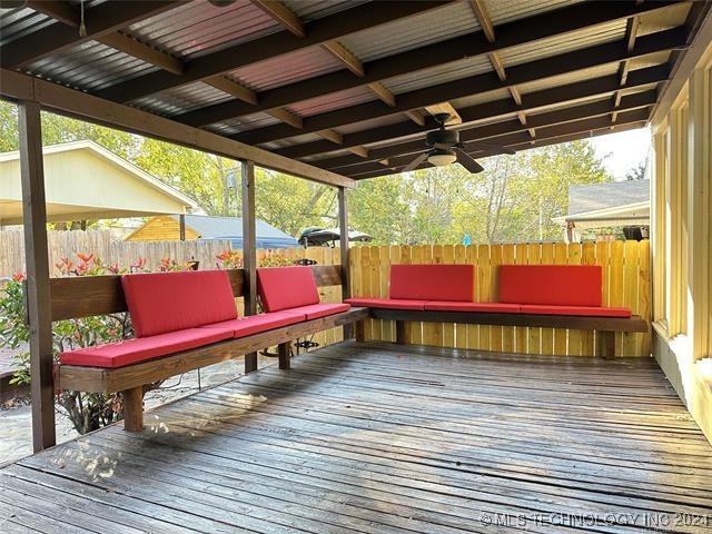 420 K St SW, Ardmore, OK 73401 - wooden terrace featuring a ceiling fan