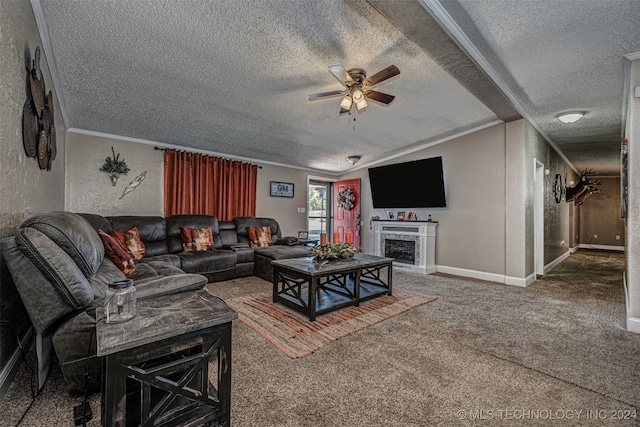 living room with vaulted ceiling, a textured ceiling, crown molding, carpet flooring, and ceiling fan