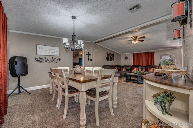 dining room featuring a textured ceiling, ceiling fan with notable chandelier, crown molding, and carpet