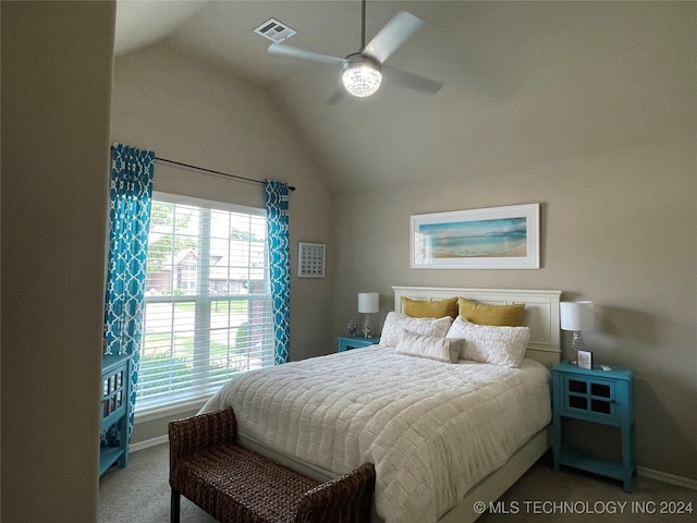 carpeted bedroom with ceiling fan and lofted ceiling