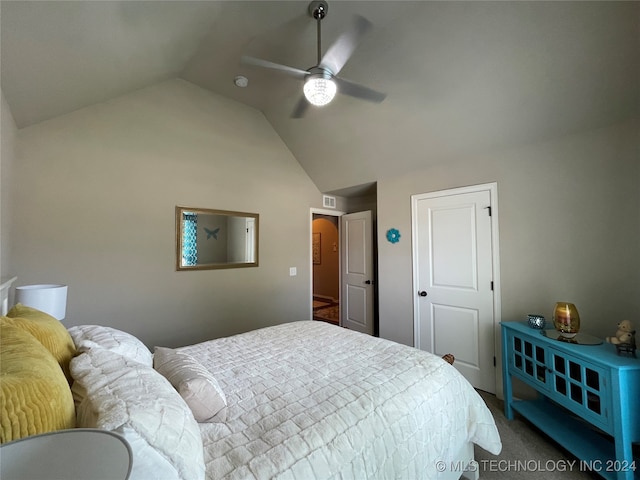 bedroom with carpet, lofted ceiling, and ceiling fan