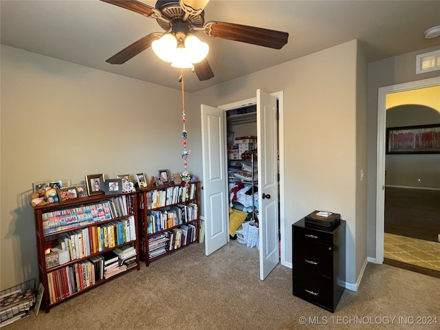 miscellaneous room featuring ceiling fan and carpet flooring