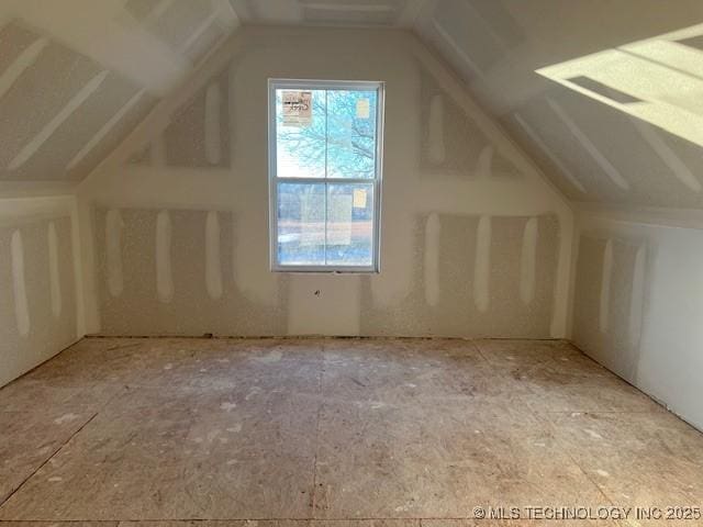 additional living space with a wealth of natural light and lofted ceiling