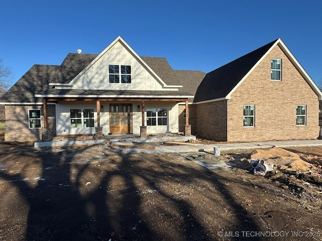 view of front of house with brick siding