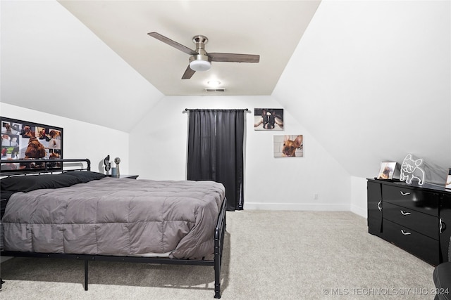 carpeted bedroom with lofted ceiling and ceiling fan