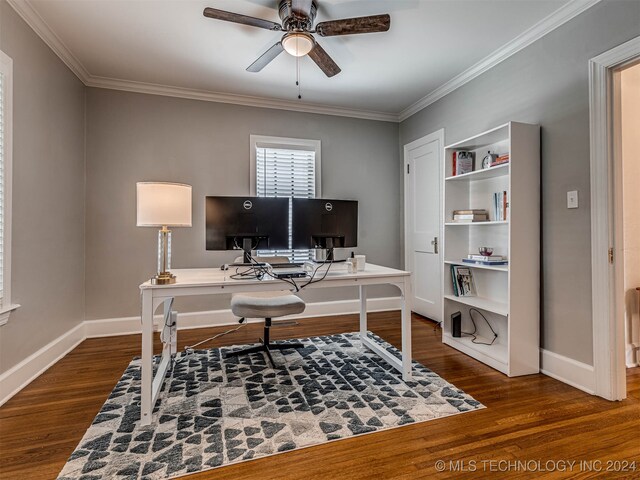 office with dark wood-type flooring, crown molding, and ceiling fan