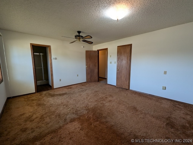 unfurnished bedroom with a textured ceiling, ceiling fan, and carpet floors