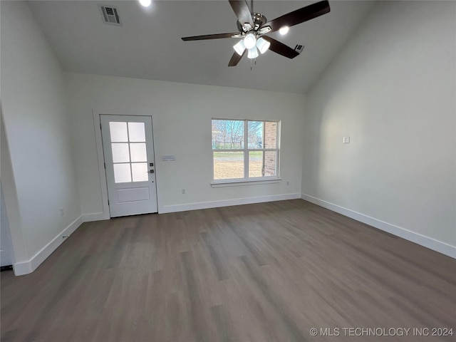 empty room featuring hardwood / wood-style floors, ceiling fan, and lofted ceiling