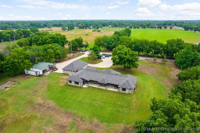 birds eye view of property featuring a rural view