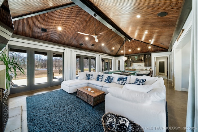 living room with a ceiling fan, vaulted ceiling with beams, french doors, wooden ceiling, and recessed lighting