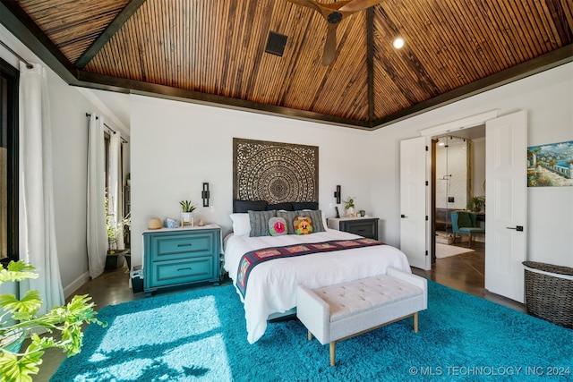 bedroom with high vaulted ceiling and wood ceiling