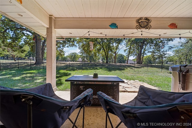 view of patio with a grill