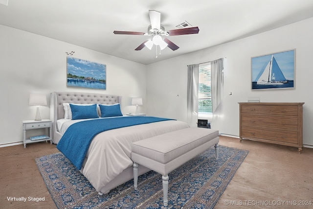 carpeted bedroom featuring ceiling fan