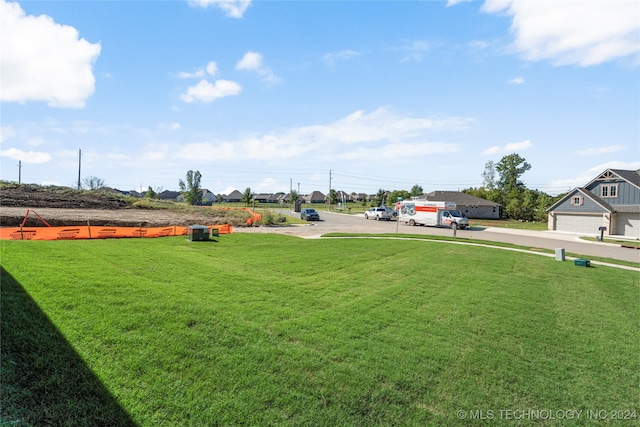 view of yard with a garage