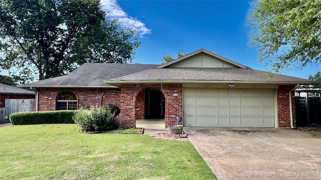 ranch-style house with a garage and a front lawn