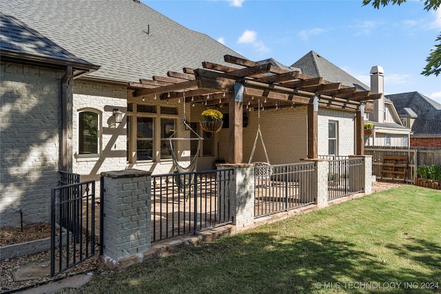 view of side of property featuring brick siding, a yard, a shingled roof, fence, and a pergola