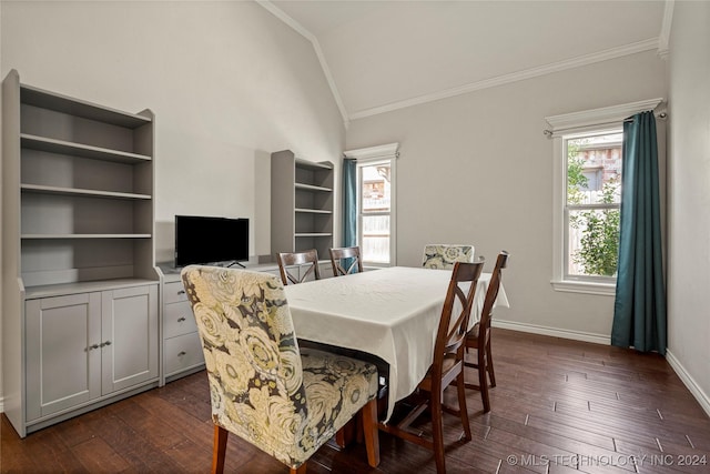 dining area with lofted ceiling, ornamental molding, dark hardwood / wood-style floors, and plenty of natural light