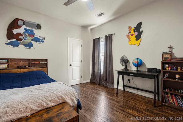 bedroom with ceiling fan and dark hardwood / wood-style floors