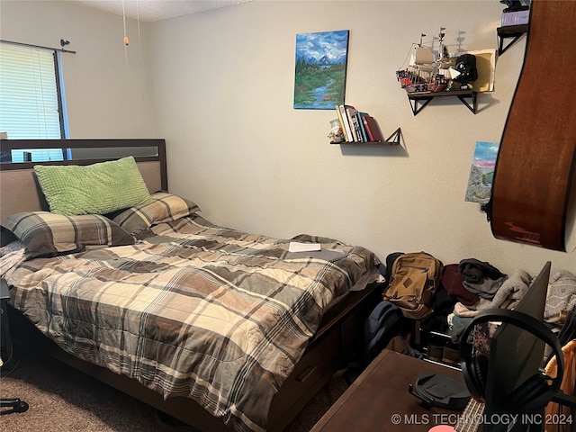 bedroom featuring carpet floors