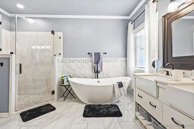 bathroom featuring crown molding, vanity, independent shower and bath, and tile walls