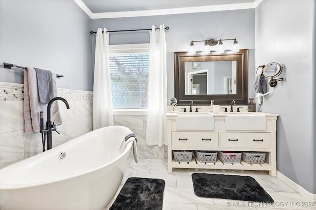 bathroom featuring a tub to relax in, crown molding, vanity, and tile walls