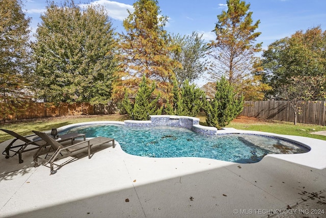 view of swimming pool with a patio