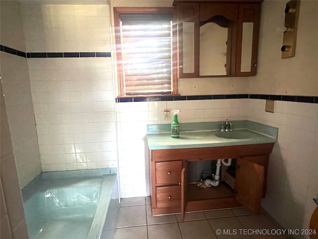 bathroom featuring a bathing tub, tile walls, and tile patterned floors