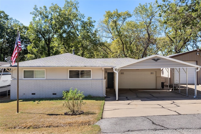 ranch-style house with a front yard, a garage, and a carport