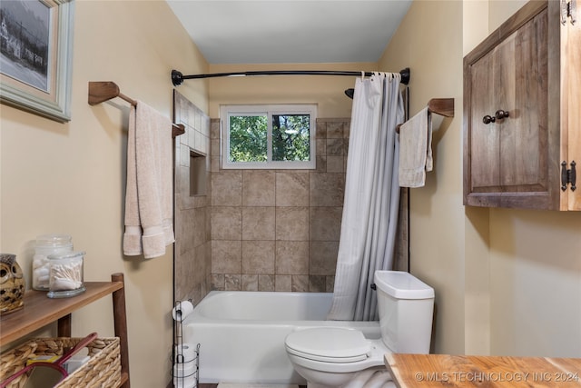 bathroom with shower / bathtub combination with curtain and toilet