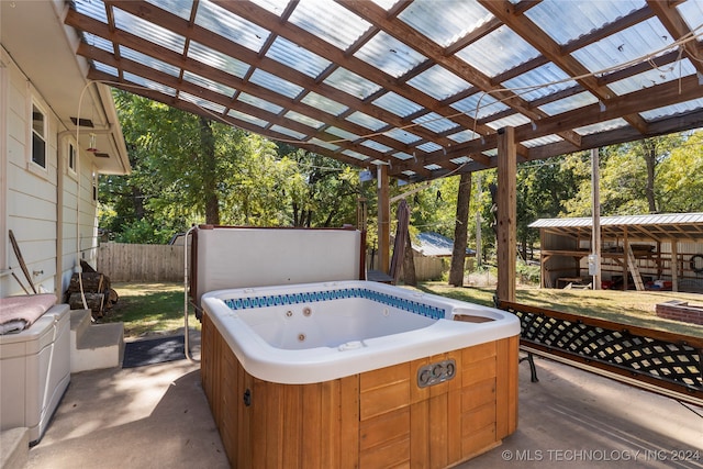 view of patio featuring a pergola and a hot tub