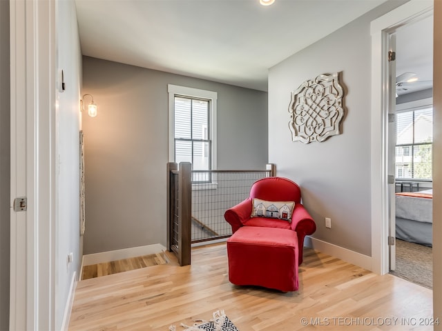 living area featuring hardwood / wood-style floors