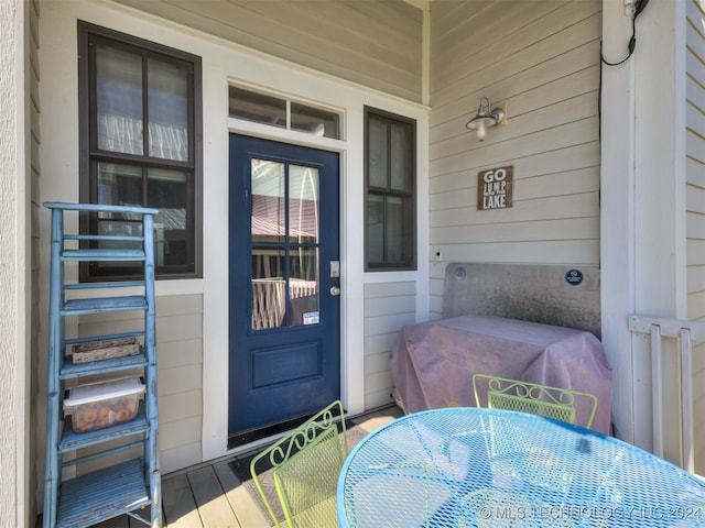 view of exterior entry featuring radiator