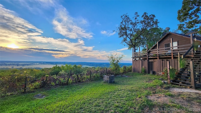 yard at dusk with an outdoor structure