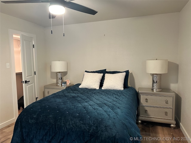 bedroom featuring ceiling fan and light hardwood / wood-style floors