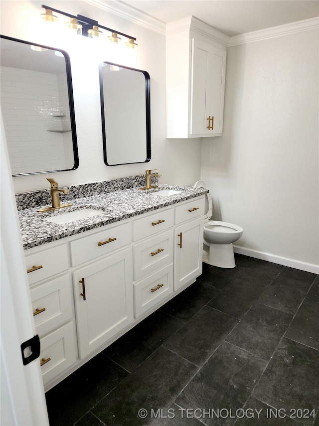 bathroom with crown molding, tile patterned flooring, vanity, and toilet