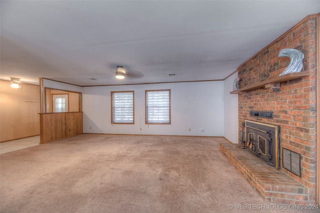 unfurnished living room featuring carpet floors