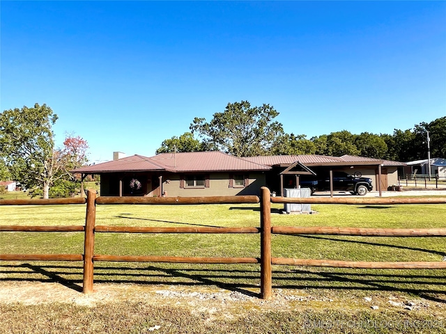 view of front facade with a front lawn