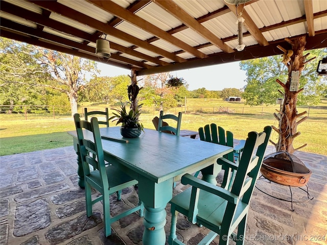 view of patio / terrace featuring ceiling fan