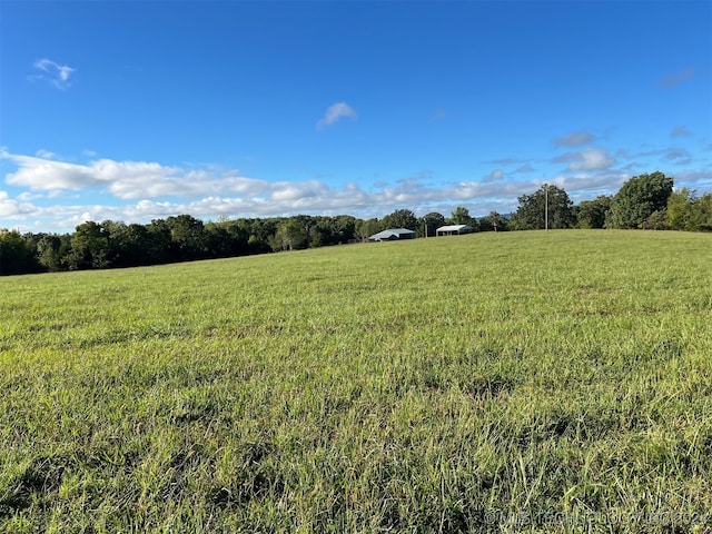 view of landscape with a rural view