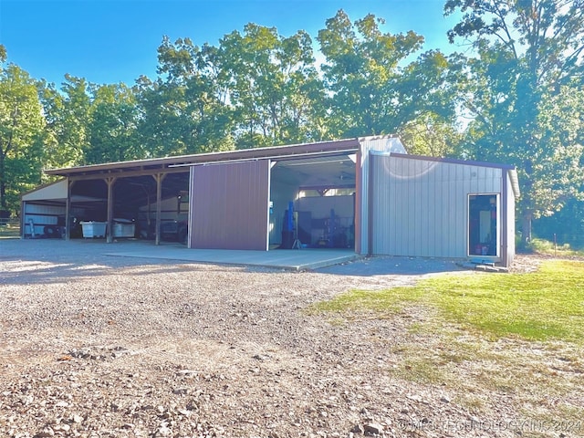 view of outdoor structure with a carport