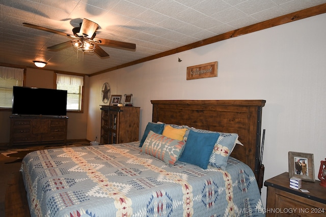 bedroom featuring wood-type flooring and ceiling fan