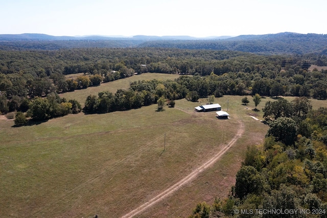 drone / aerial view with a mountain view and a rural view