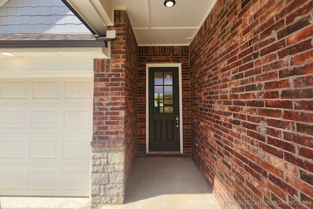 entrance to property with a garage